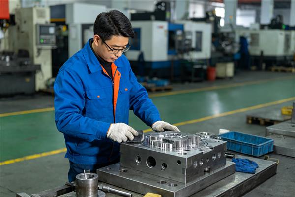 How often should stamping dies be inspected and maintained?