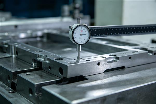 Blank Holder Force Optimization for Deep Drawing Dies in Automotive Manufacturing